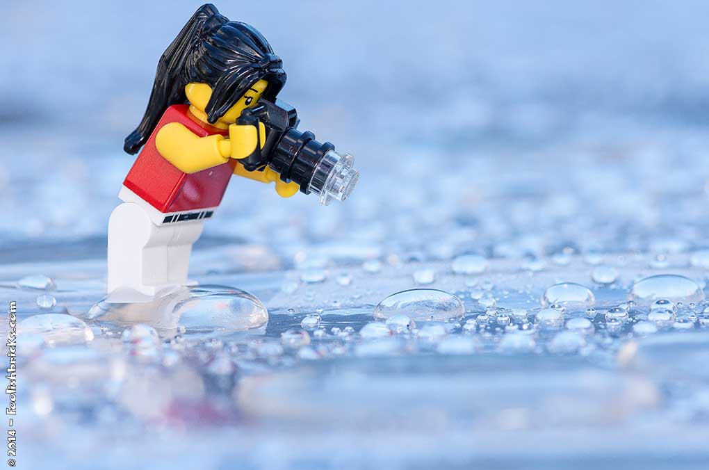 Lego photography - toy photographer rain drops