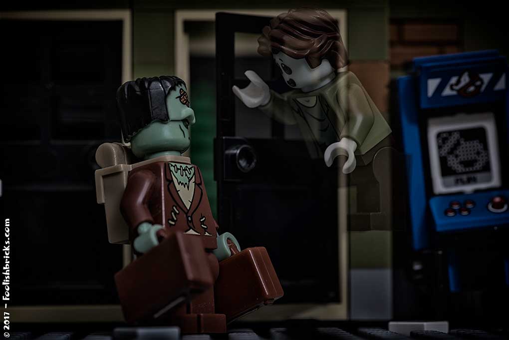 lego frankenstein caries suitcases and talks to a ghost